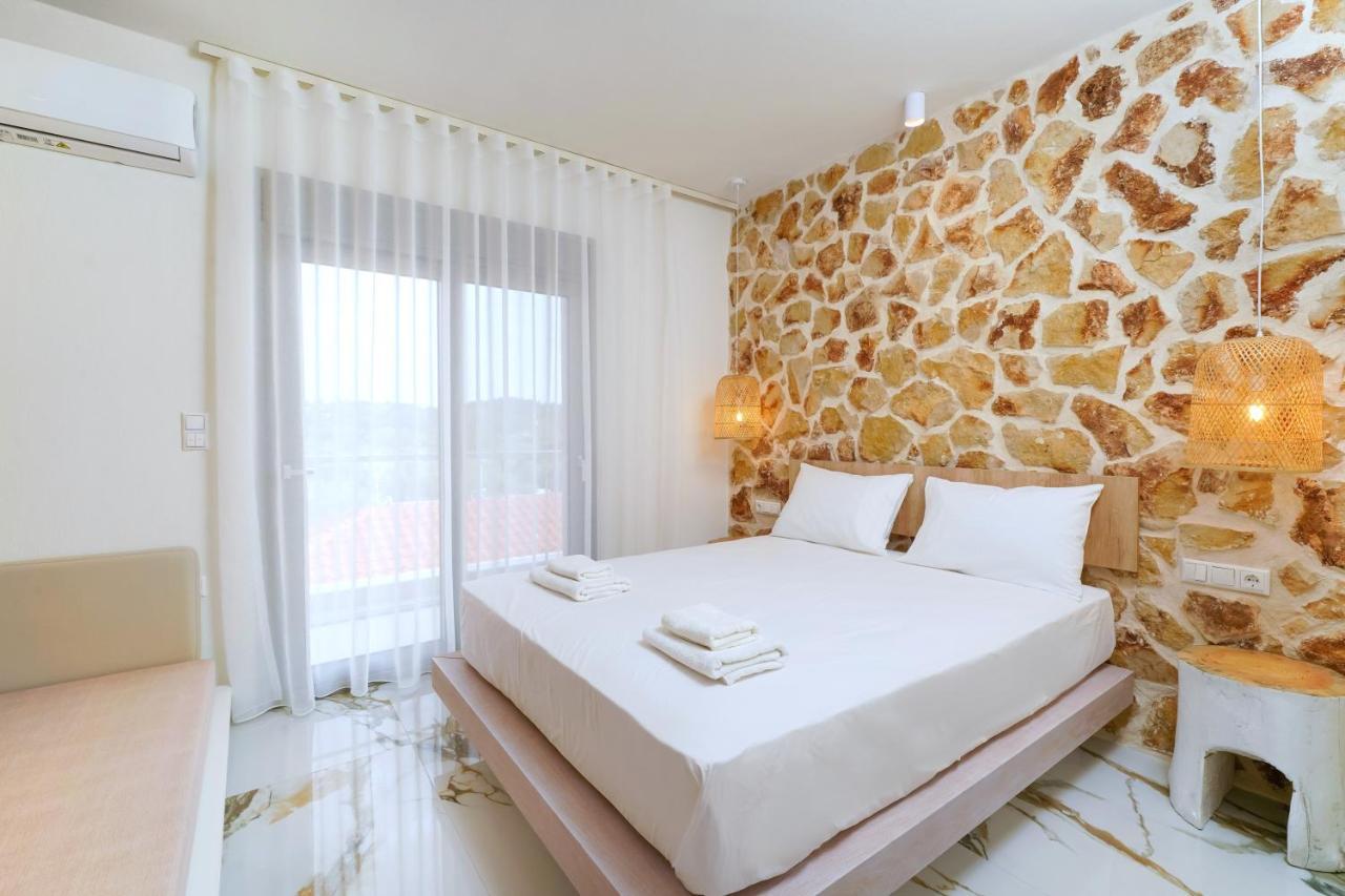 Athina Palace Luxurious Appartments Potos Exterior foto
